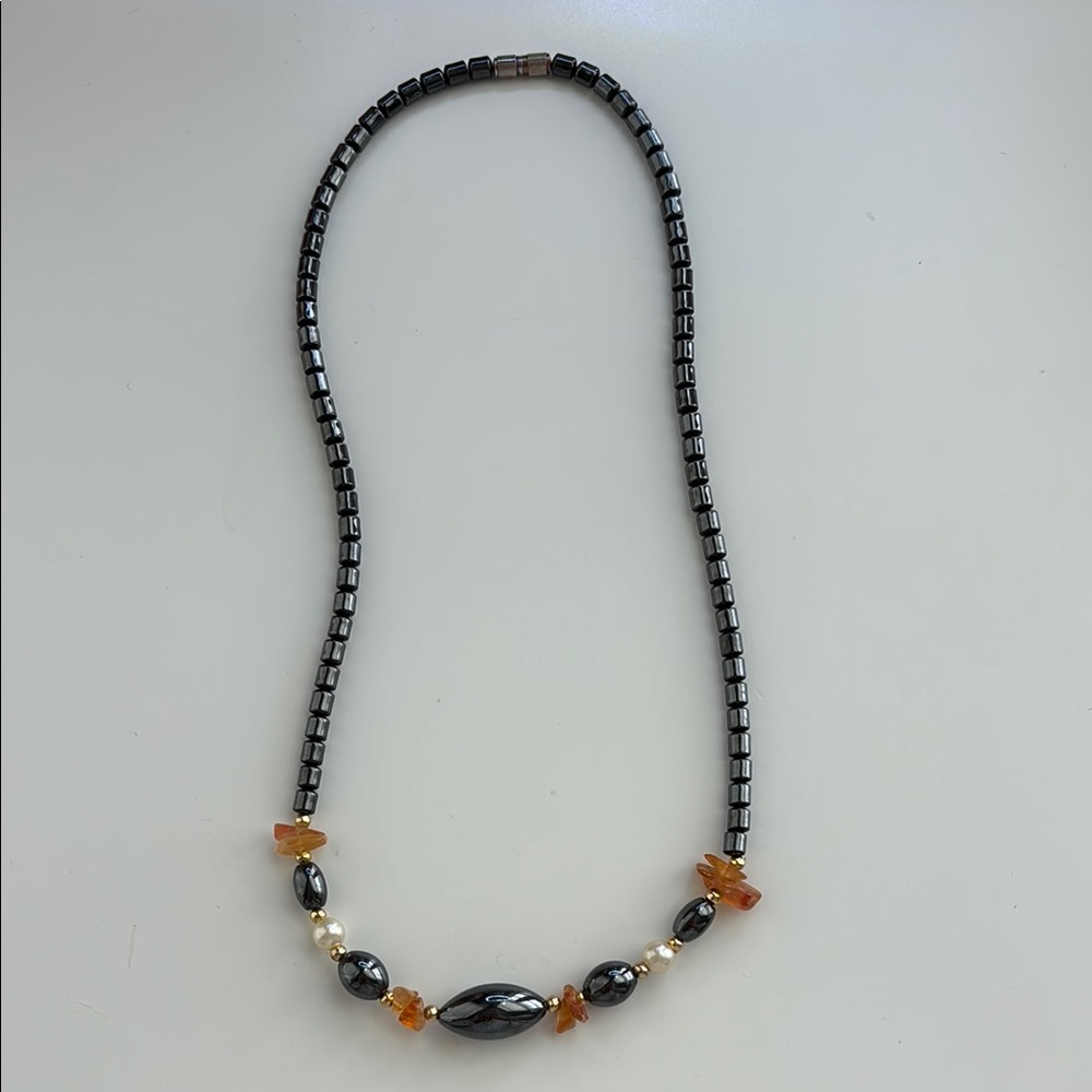 elegant black and gold beaded necklace